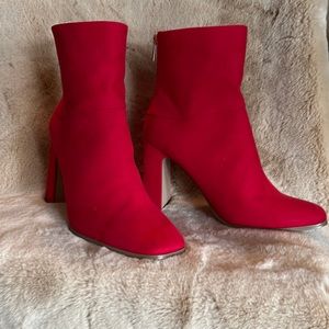 Red heeled boots.